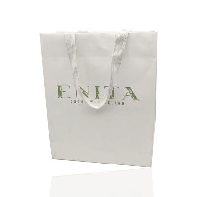 China Recycled Materials Paper Handbags Handles Custom White Kraft Paper Bag for sale