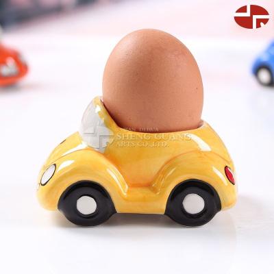 China Sustainable Ceramic Car Design With Paint Dolomite Egg Holder Cup for sale