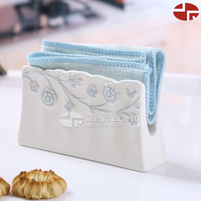 China Flower Design Dolomite Napkin Holder Sponge Viable Ceramic Glaze Embossed Holder for sale