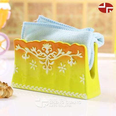 China Eco-friendly ceramic fabric holder in snow pattern.flower design for sale