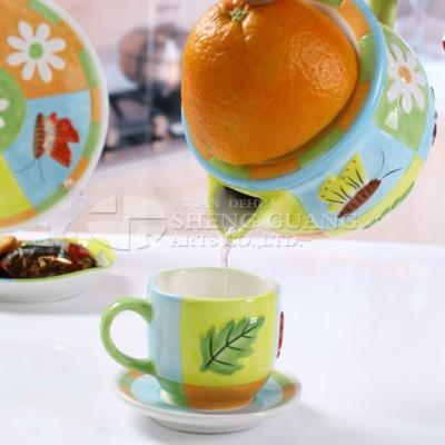 China Sustainable Spring Style Painting Design Ceramic Orange-Juice Jar Set With Cup And Saucer for sale