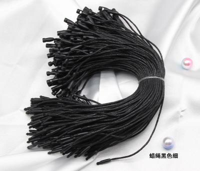 China Viable Running Thread Seal No Logo Plastic Cotton Or Elastic Tag Strings Paper Tag For Clothes And Bags for sale