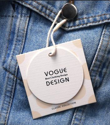 China Sustainable Vogue design embossed with gold foiled and also printing UV customized garment hanger tag paper label for jeans clothing and shoes for sale