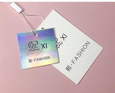 China Viable Customized Tag Label For Customized Foiled Embossed Printing With UV Garment Hanger Tag Paper Tag For Jeans Clothing And Garments for sale