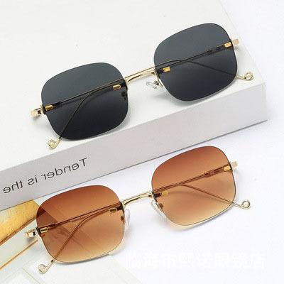 China 15 years old experience the new Korean version of the sunglasses the cut sunglasses rimless rimless flat reflect the oval sharp red simple sunglasses for sale