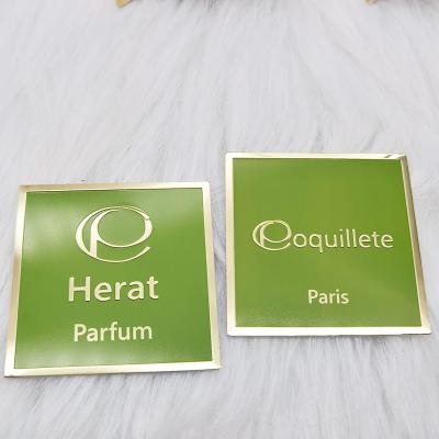 China Custom Gold Metal Embossed Label Europe Logo Sticker Aluminum Perfume Label For Perfume Bottle for sale