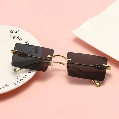 China Fashion Sunglasses 2022 New Fashion Sunglasses Small Case Ladies Shades Frameless Sunglasses for sale