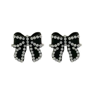 China Pearl Fashion Female Earrings Whimsical Casual/Sporty Bow Earrings Contracted New Silver Joker Needle Bowtie Ear Stud for sale