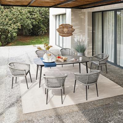 China Artie All Weather Outdoor Restaurant Furniture Garden Aluminum Rope Woven Outdoor Dining Table Set for sale