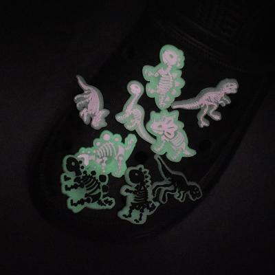 China Durable and Soft Glowing Dinosaurs in Dark Shoe Charms Different Species Dinosaur Croc Shoe Accessories Birthday Party Decoration for sale