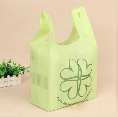 China Light Green 70gsm Non Woven PP T-shirt Bag Eco Friendly Gift Shopping Bags Eco Friendly Bags for sale