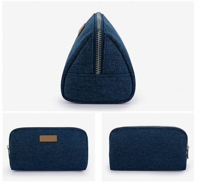 China Custom Made Durable Zipper Denim Cosmetic Bag Blue Jeans Makeup Bag Denim Cosmetic Clutch Make Up Bag For Women for sale