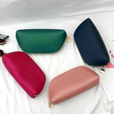 China BSCI Factory OEM Durable Custom Logo Premium Makeup Travel Toiletry Red Green Women's PU Cosmetic Bag for sale