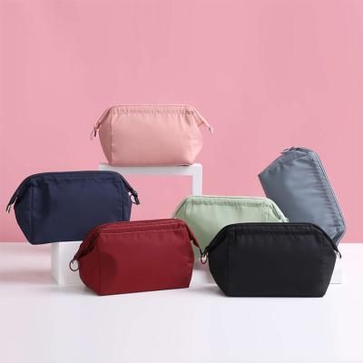 China Durable Large Capacity Waterproof Makeup Organizer Bag Professional Color Morandi Makeup Bag for sale