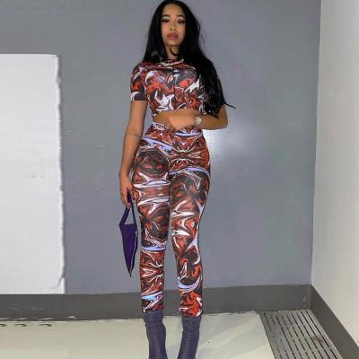 China Spring 2021 Women QUICK DRY Elastic Short Sleeve Floral Print Long Pencil Pants Sport Sets Yoga Two Piece Set for sale