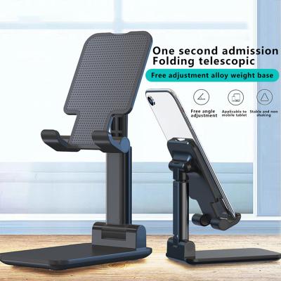 China Foldable Adjustable Foldable Mobile Phone Holder Aluminum Alloy Car Phone Holder Magnetic Foldable Phone Holder for sale