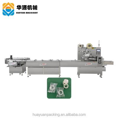 China High Quality Automatic Adhesive Type HUAYUAN Food Pillow Machine 300bags/min Gauze Bandage Tape Candy Stick Flow Packing Packaging Machine for sale