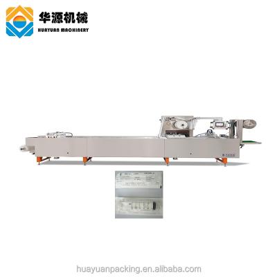 China Medical High Quality Automatic Paper PVC PE Products HUAYUAN Electric Syringe Blister Packing Machine For Disposable Syringe for sale