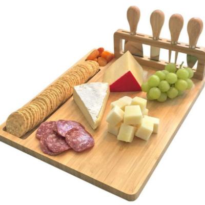 China Sustainable Bamboo Wooden Cheese Board Meat Charioteer Tray Serving Tray With Cheese Stainless Steel Knives for sale