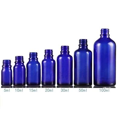 China Cosmetic Bottle 5ml 10ml 15ml 20ml 30ml 50ml 100ml Blue Glass Round 18mm Caliber European Glass Bottle For Essential Oil for sale