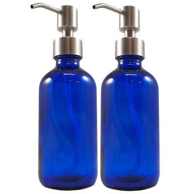 China Boston Chemical Round Blue Cobalt Glass Bottle With Stainless Steel Pumps for sale