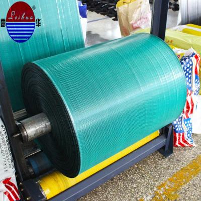 Cina 50kg/pp woven fabric/pp woven bags recyclable pp woven roll for chemical, feed, packaging, industrial applications in vendita