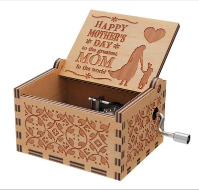 China Melody Hand Crank Laser Engraved Disposable Cheap Popular Crank Gift Wooden Music Box for sale