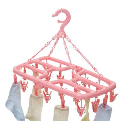 China Multifunctional Laundry Drying Rack Hooks Hanger Clip And Drip Plastic Foldable Windproof Hook Clothes Hanging With 24 Pins for sale