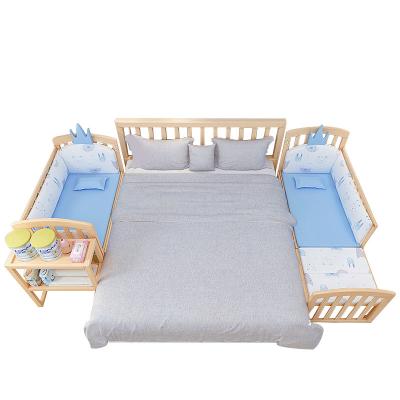 China Modern Crib Splicing Baby Crib Large Bed Multifunctional Newborn Sleep Hut Mobile BB Bed with Roller for sale