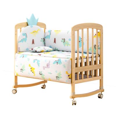 China Modern Wooden Multifunctional Baby Folding Crib Baby Rocking Bed Child Variable Bed for sale