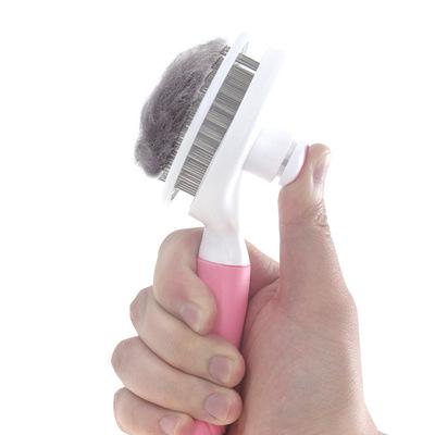 China Viable Pink Pet Cleaning Tool Pet Grooming Brush and Grooming Needle Comb Automatic Deshedding Remover for sale