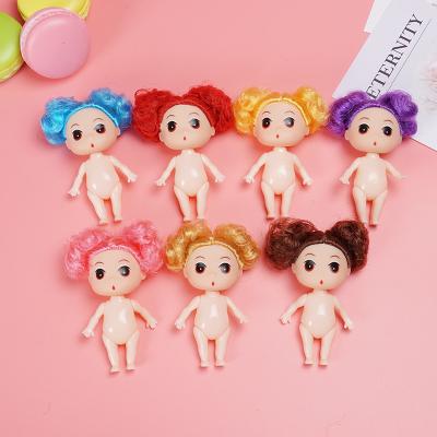 China Soft Cute Little Baby Toy Plastic Toy Mini Doll Bake Mold 9cm DIY Cupcake Decorated Doll for sale