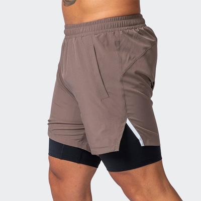 China 2022 Running Shorts Men QUICK DRY 2 in 1 GYM Double Decker Quick Dry Sport Shorts Jogging Fitness Workout Shorts for sale