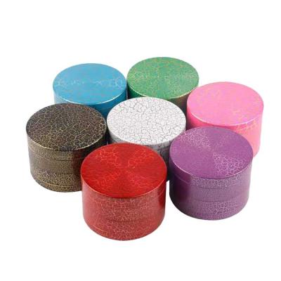 China Herb Grinder Spice Crusher Wholesale Herb Grinder Unique Crack Design 63mm Weed Dry Smoking Weed Tobacco Weed 2021 New for sale