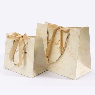 China Recyclable Custom Packaging Bags Marble Cosmetics Shopping Gift Bags Luxury Wholesale Gift Bag With Ribbon for sale