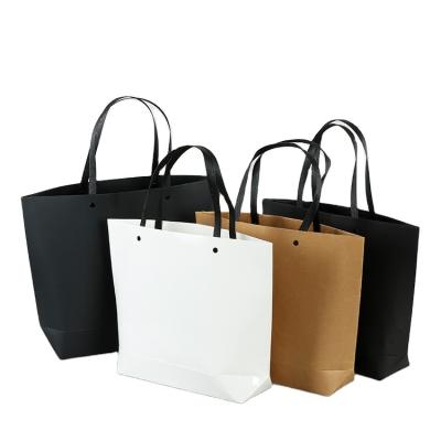 China Garment Packaging White Paper Bag Kraft Paper Ship Large Capacity Recyclable Black Paper Bag, Gift Cosmetic Bags With Handle for sale