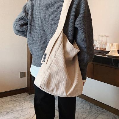 China 2022 Fashionable and elegant simple portable large capacity bag corduroy fabric shoulder bag Korean style NEW for sale