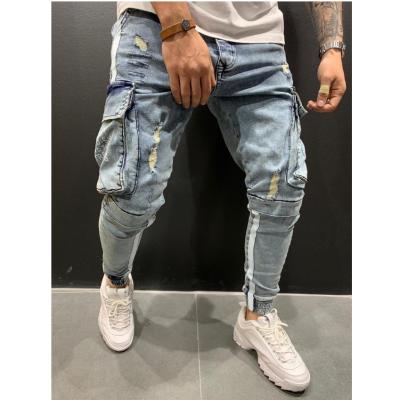 China New Design QUICK DRY Blue Stylish Scratch Distressed Denim Trotter Pants China Men Jeans Manufacturer for sale