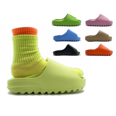 China Cheap custom fashion trend eva foam injection unisex shoes lace orange yeezy slides slippers for women men for sale