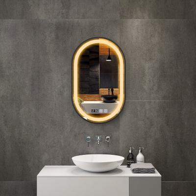 China Modern Oval Home Bathroom Furniture Magnifying Light Warm White Gold Smart Mirror for sale