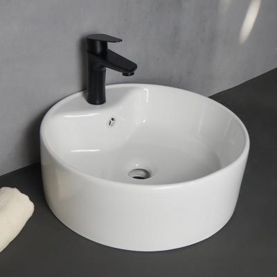 China Modern Factory Price Above Counter Fixture White Laundry Sinks Ceramic Art Basin for sale