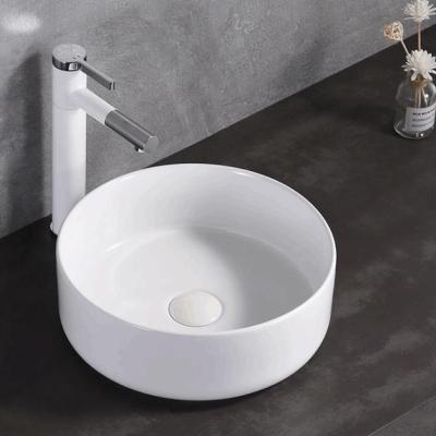 China Easy clean up; Soomth Modern Round White Ceramic Vessel Vanity Sink Table Top Countertop Wash Basin for sale