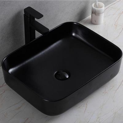 China Modern Rectangular Tarpul Matt Black Basin Countertop Porcelain Vanity Bathroom Ceramic Sinks for sale