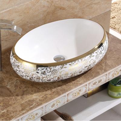 China Modern Europe Style Vintage Style Vanity Basin Countertop Luxury Ceramic Sink Bathroom Gold Ceramic Wash Basin for sale