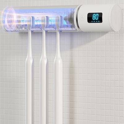 China UV Disinfection + Drying Wholesale Wall Mounted Smart Toothbrush Holder Dispenser Toothbrush and Toothpaste Holder Toothbrush Storage for sale