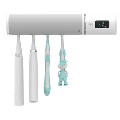 China UV Disinfection + Drying Multifunctional Wall Mounted Toothpaste Dispenser Holder Toothbrush Holder Toothbrush Holder for sale