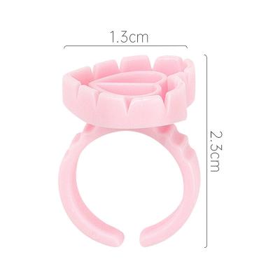 China Plug grafting glue embroidery wholesale eyelashes a ring blooming cup around the blooming cup 100/pack water heart-shaped ring glue drip color for sale