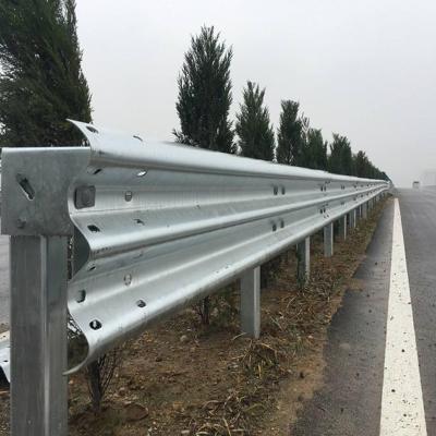 China Guardrail Q235 W Metal Beam Crash Barrier AASHTO M180 Road Galvanized Guardrail 550g Galvanized Pavement Guardrail for sale