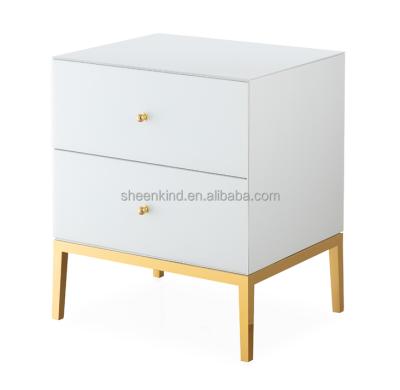 China Luxury Light Luxury Nightstand Bedroom Stainless Steel White Glass Nightstand for sale