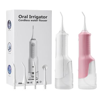 China Household Electric Portable Irrigator Cordless Teeth Water Whitening Rechargeable Ultrasonic Teeth Cleaner Oral Irrigator for sale